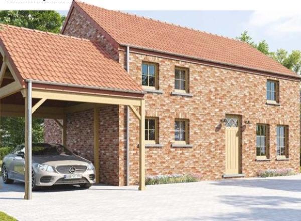 A PHILIPPEVILLE, à 240 m de la Place, une villa avec 3 chambres, une cuisine équipée et le carport.